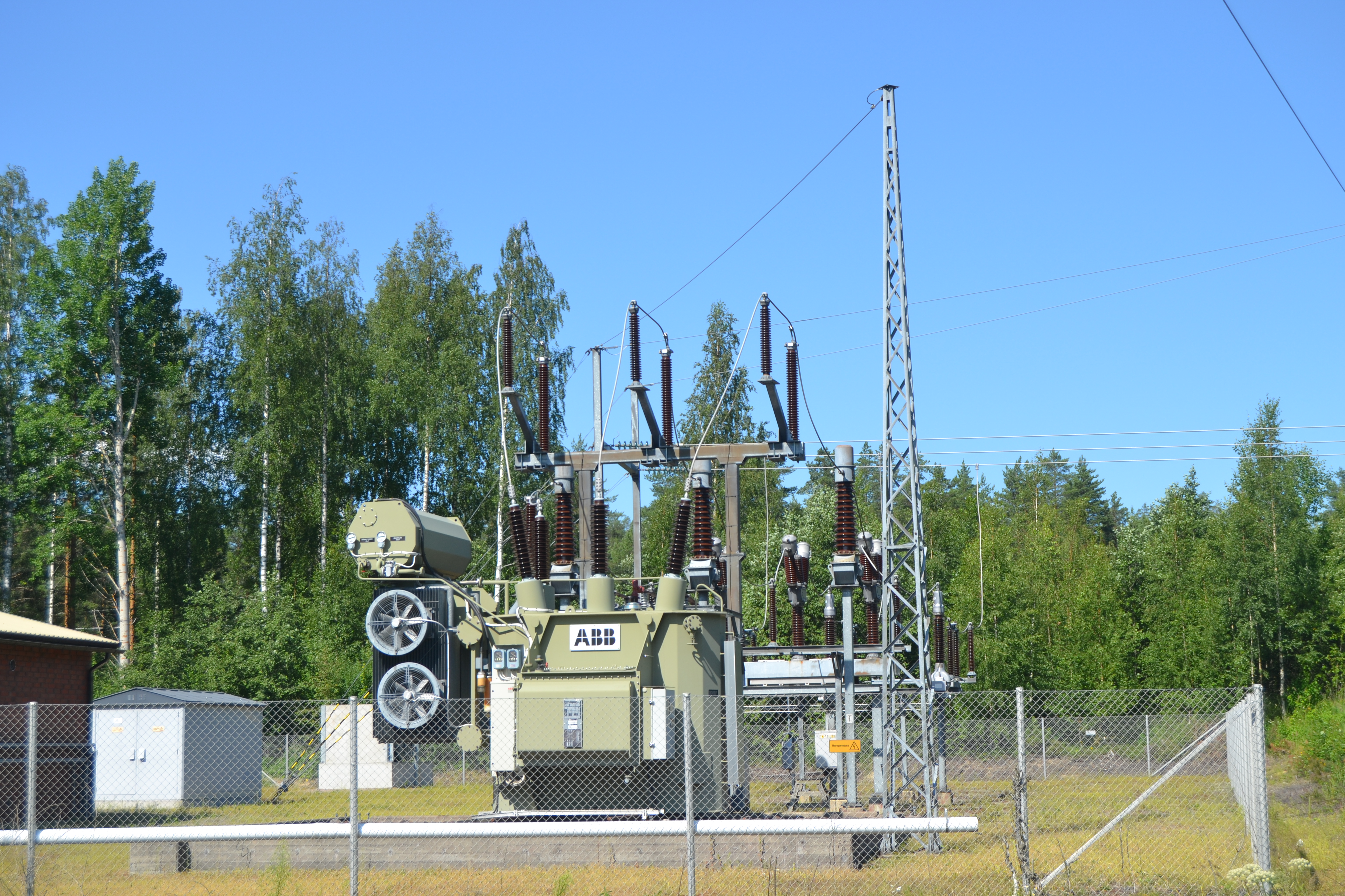 High-voltage electrical transformer at a substation