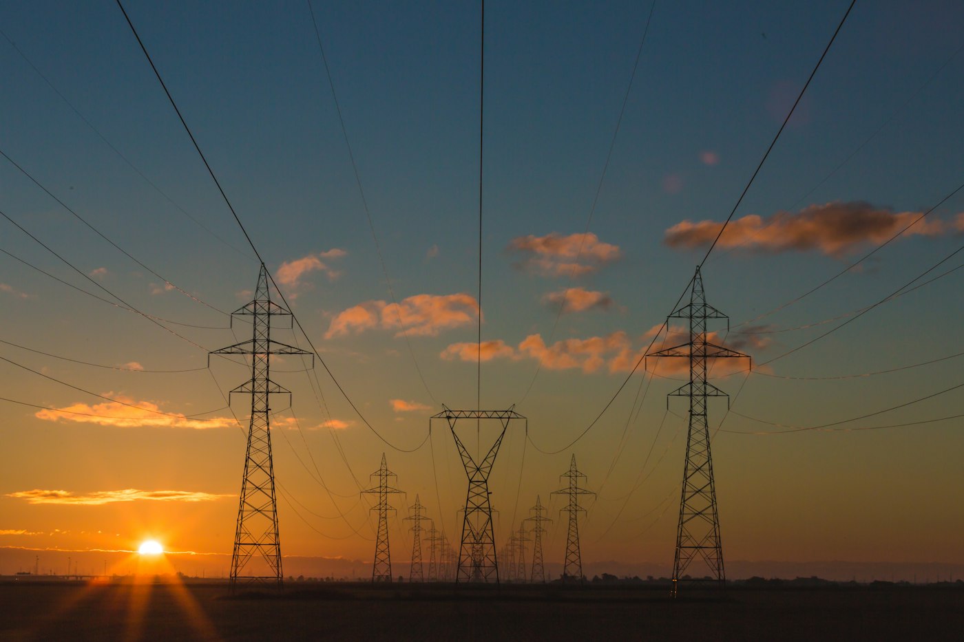 Transmission lines at sunset