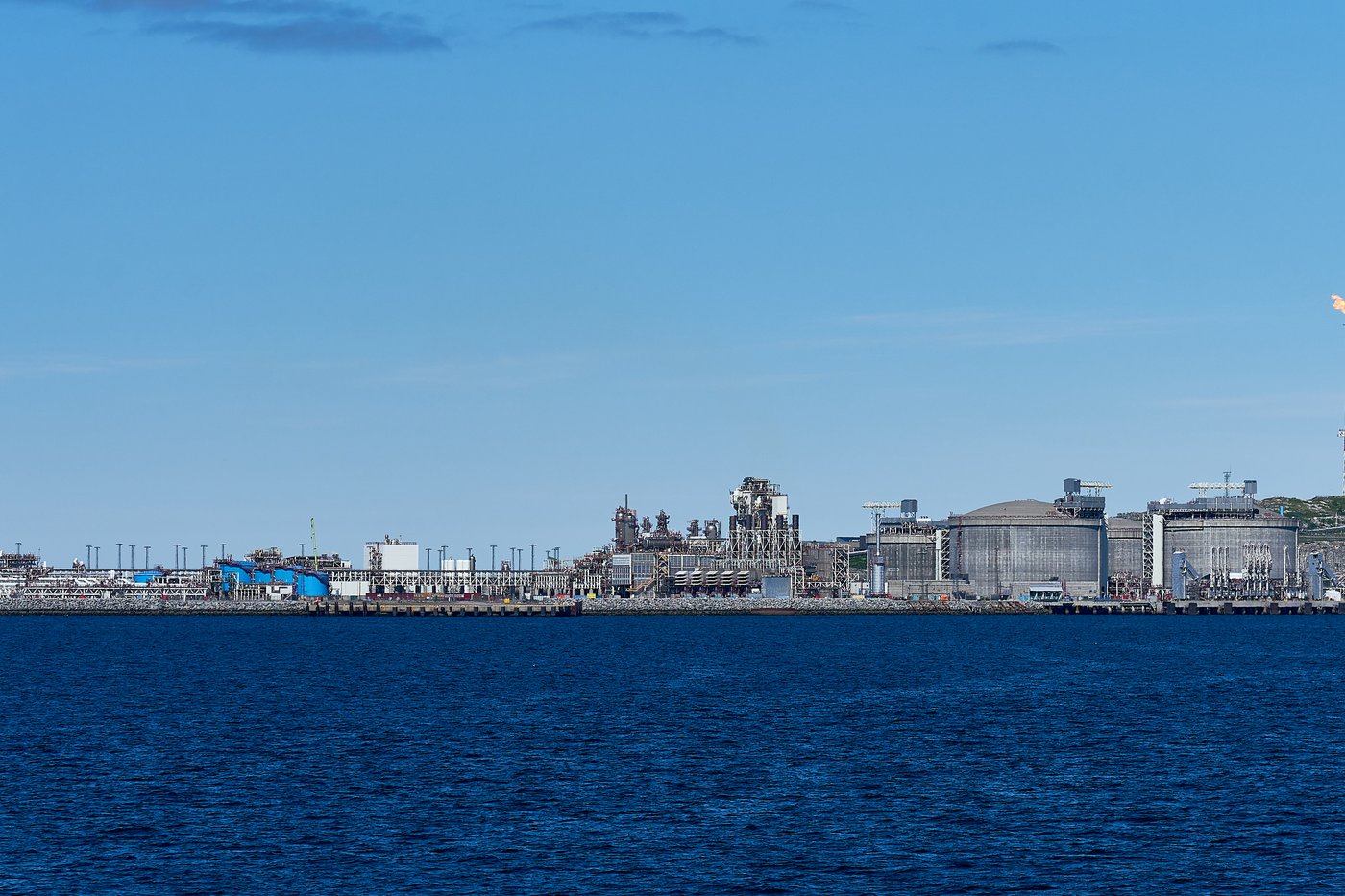 LNG storage tanks and process plant on an industrial island