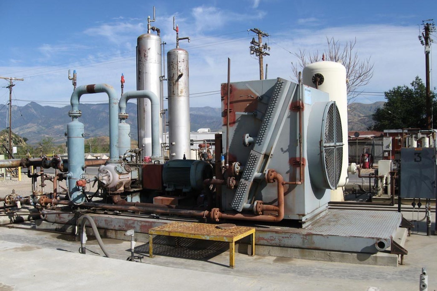 Natural gas compressor on a wellsite